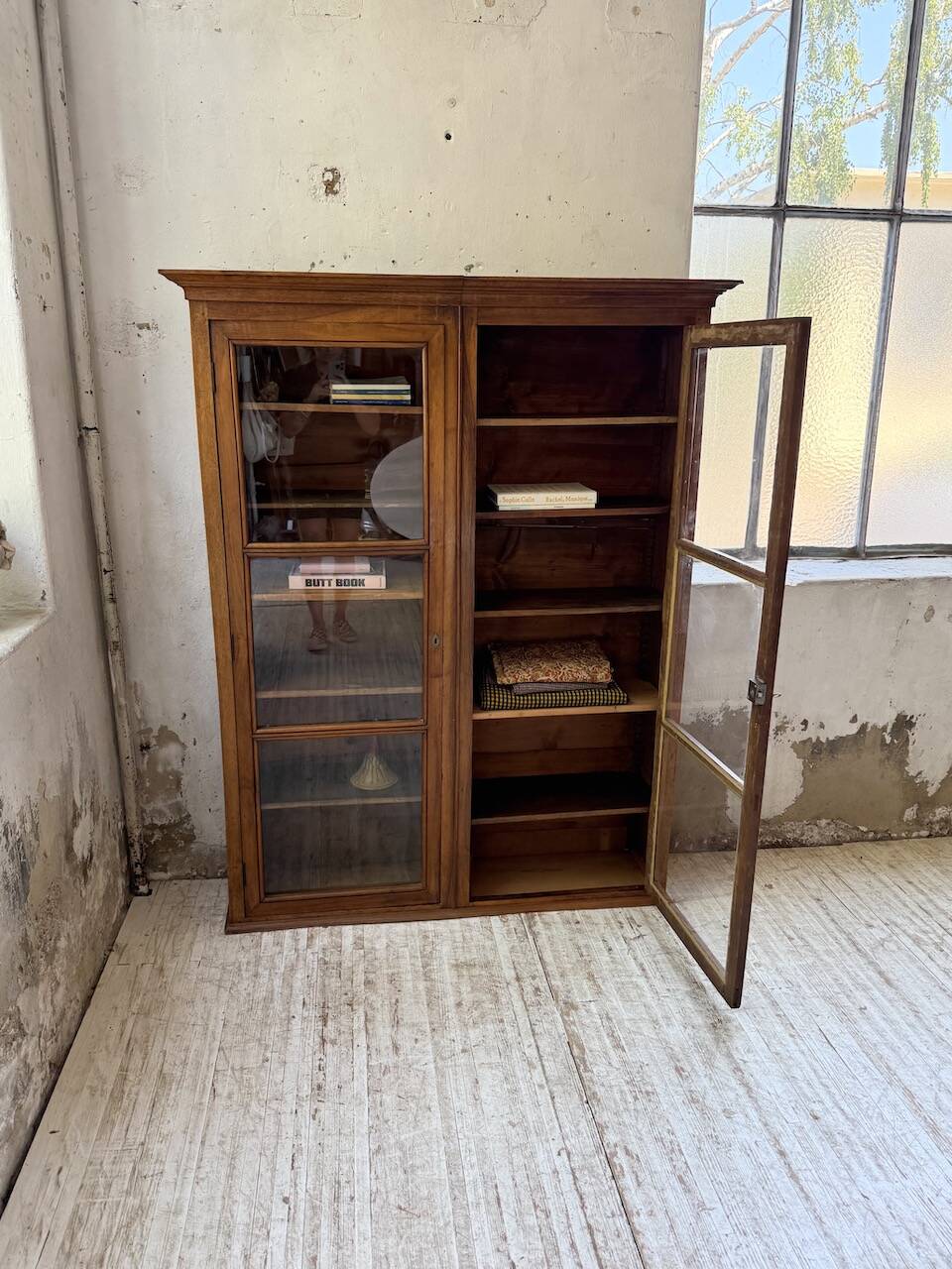 Glass-fronted walnut library 1900