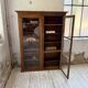 Glass-fronted walnut library 1900