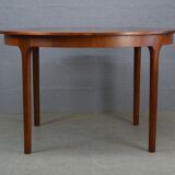 Round teak dinning table and chairs by Mctintosh