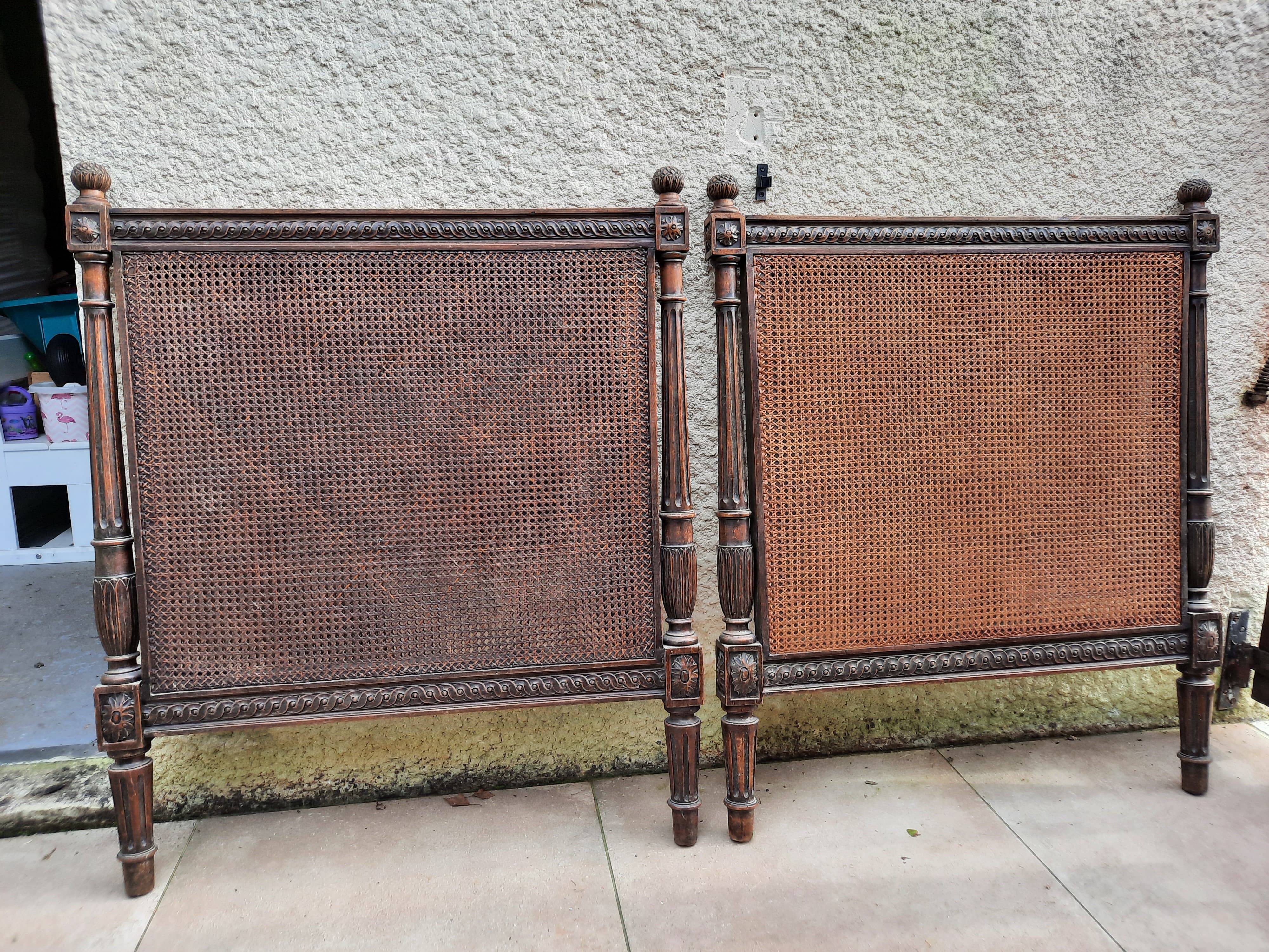 Hand-carved Louis XVI style headboards with chic vintage caning (1800s)