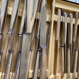 Box of silver metal knives