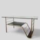 Table basse moderniste en métal et verre fumé