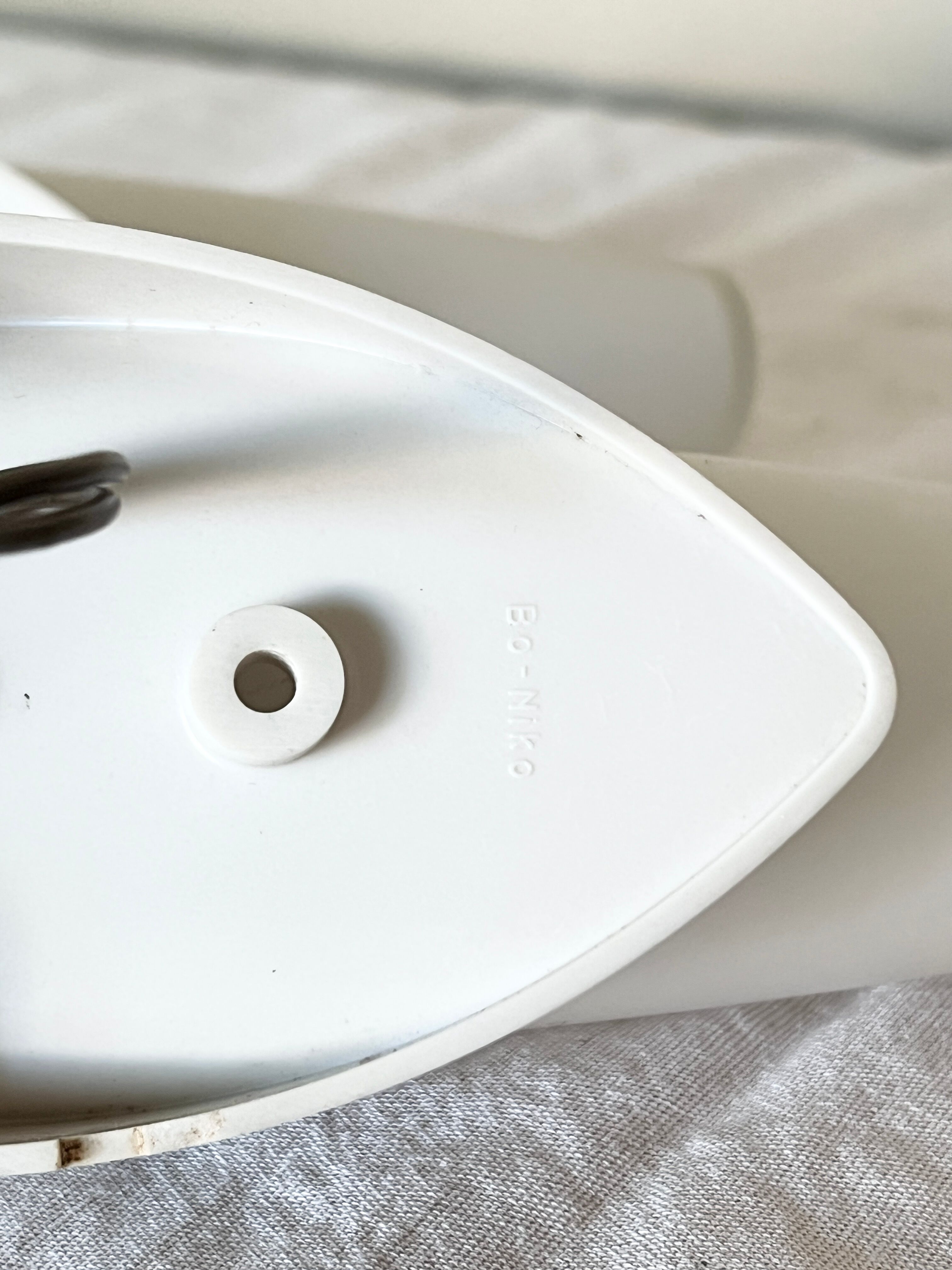 Set of two Small mid-century bakelite & glass wall lamps by Bo Niko Belgium, 1960s