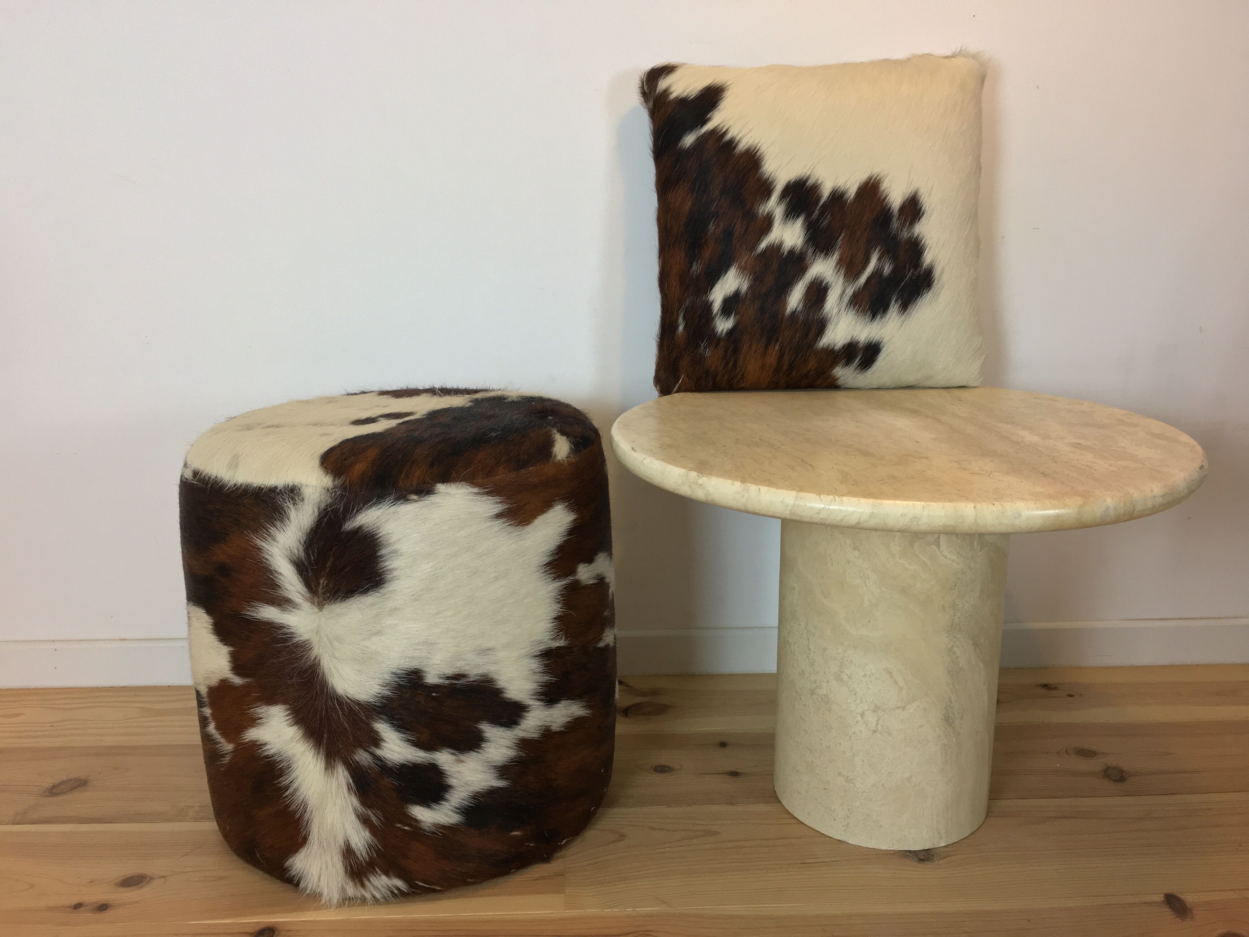 Pouf and cow cushion, leather