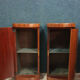 Pair of ceremonial furniture at pedestal support height functions as libraries