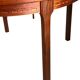 Round dining table in rosewood.