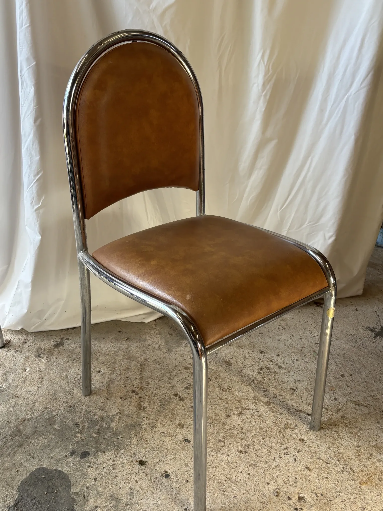 Set of 4 vintage tubular chrome chairs