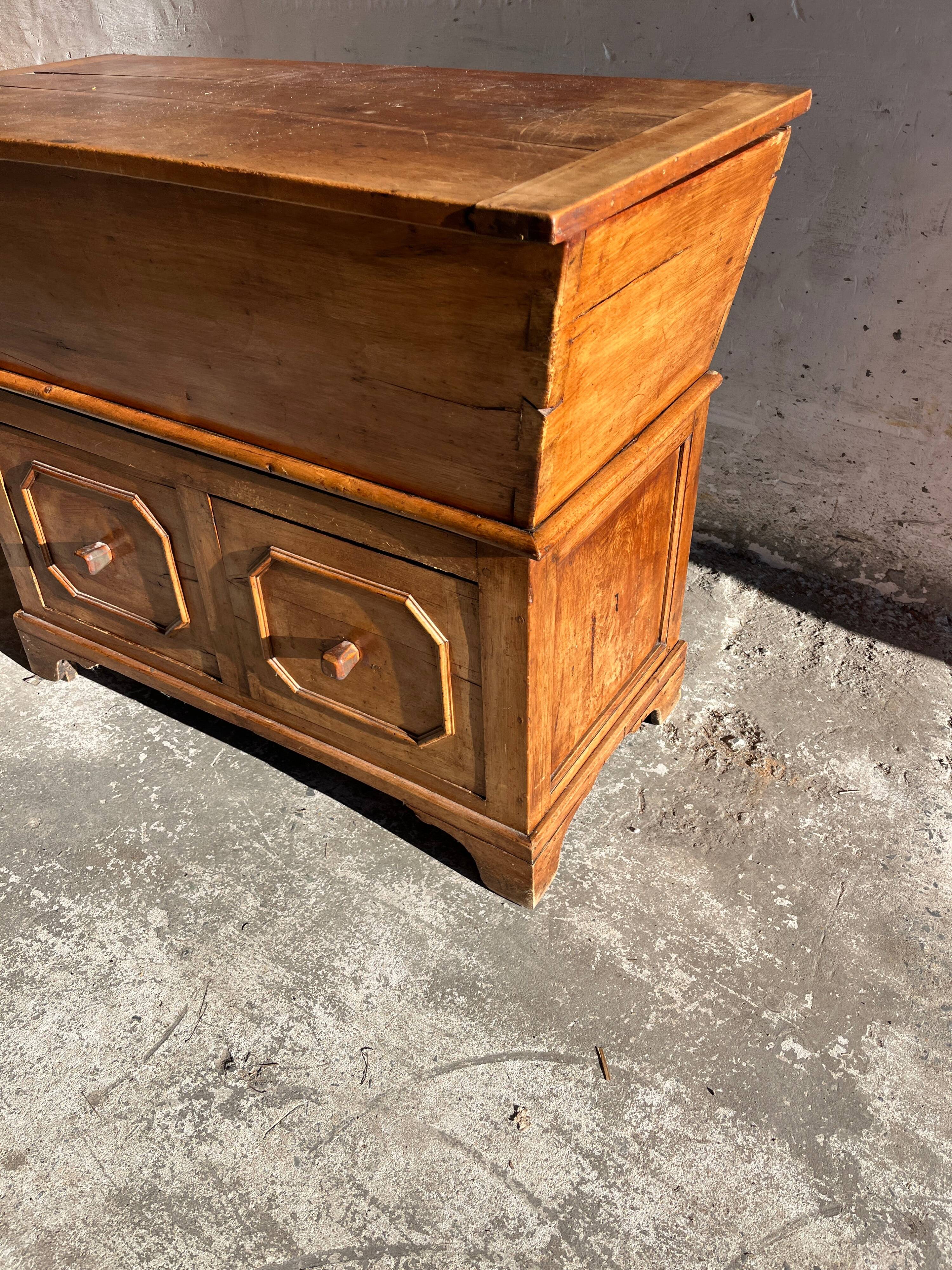 Old wooden baker's chest with storage drawers