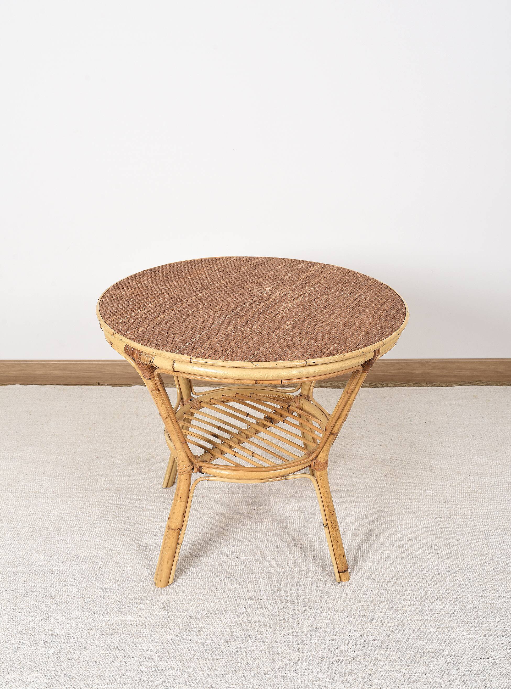 Old round rattan table, vintage from the 70s - 80s. Small table, or side table.