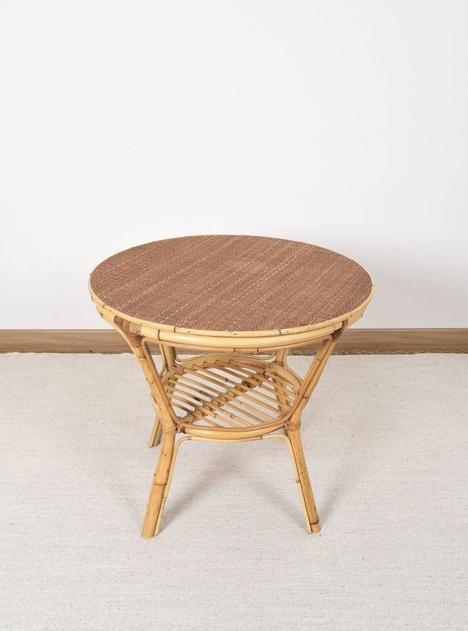 Old round rattan table, vintage from the 70s - 80s. Small table, or side table.