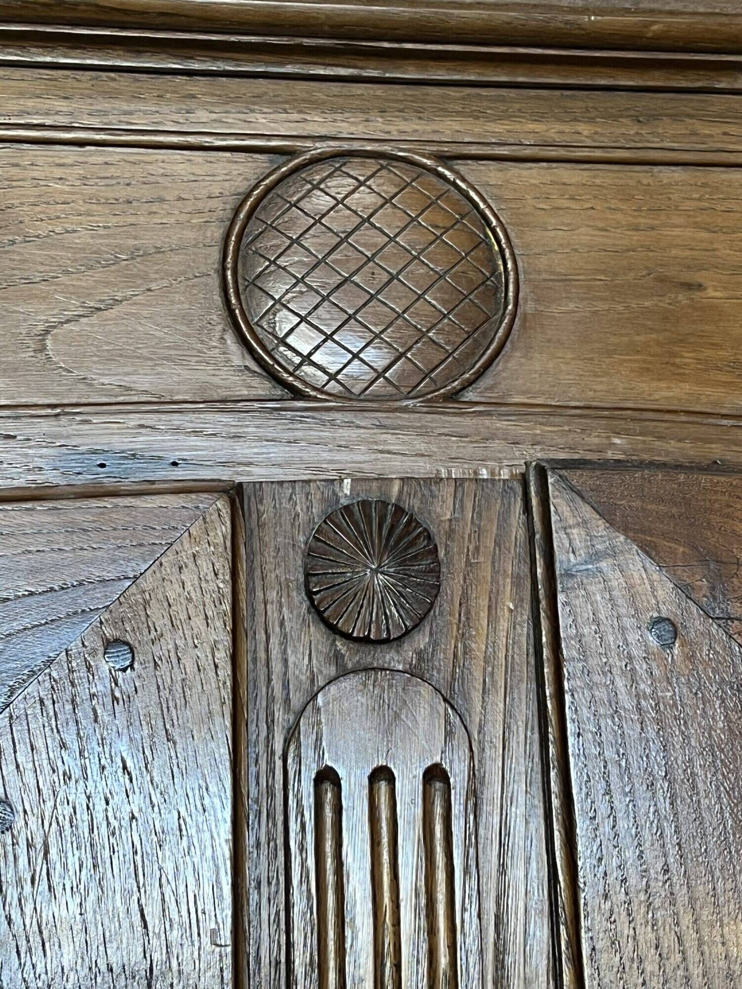 Very beautiful and old carved wooden wardrobe from the 19th century, small size, height 211 cm.