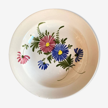 Large hollow dish in old flowered earthenware