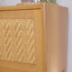 Meuble en bois et rotin pieds compas sur roulettes