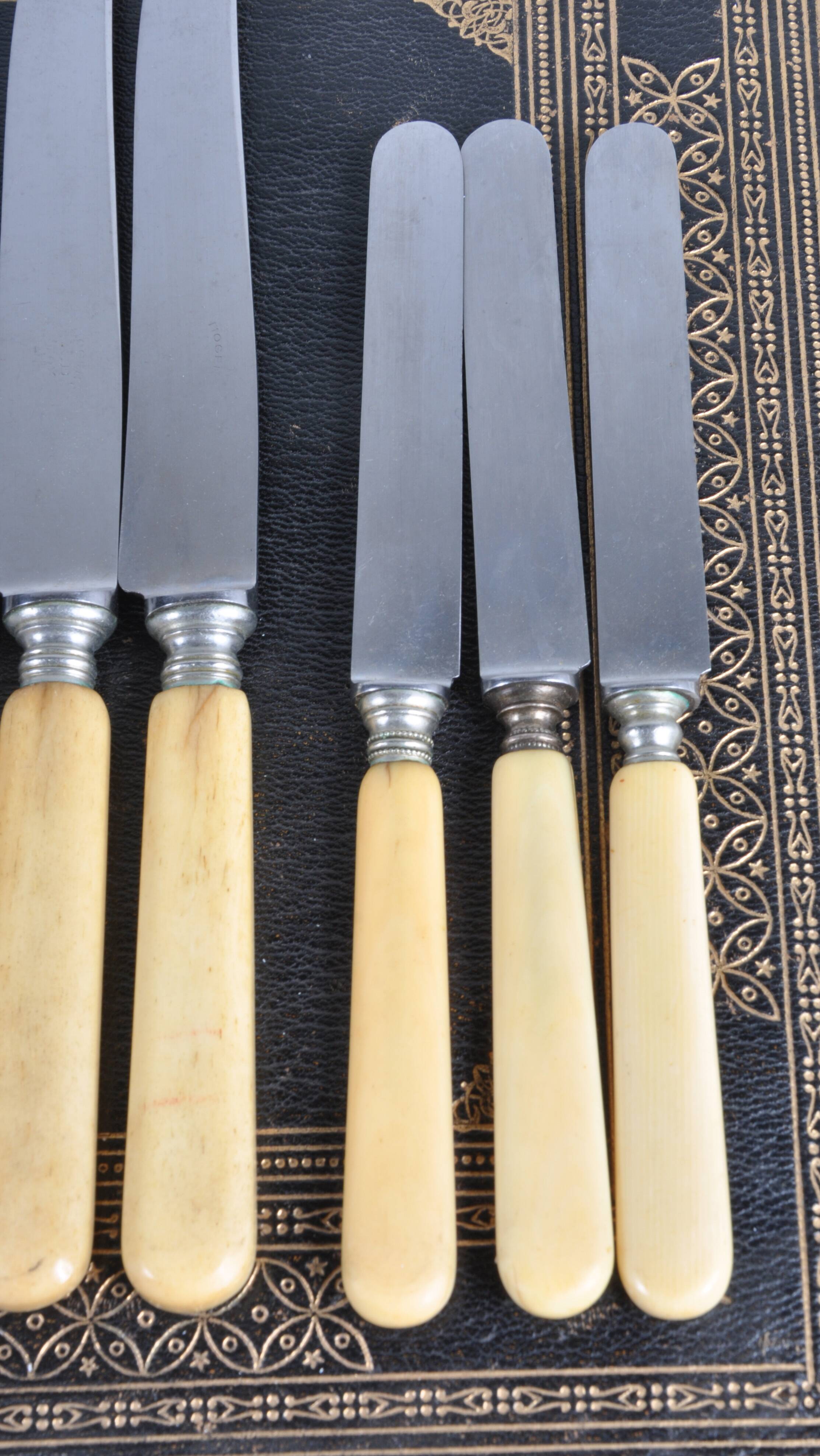 Antique knives with ivory handles.