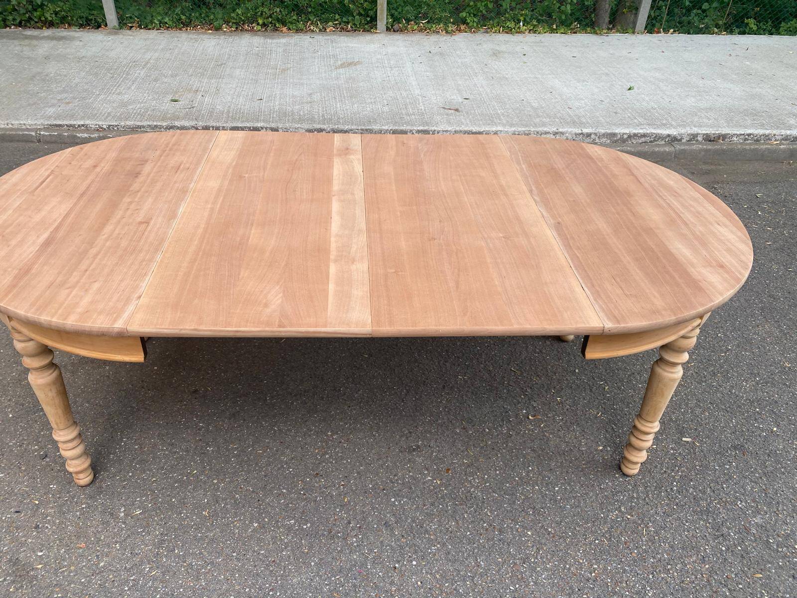 Round extendable dining table stripped in solid cherry wood France 1950