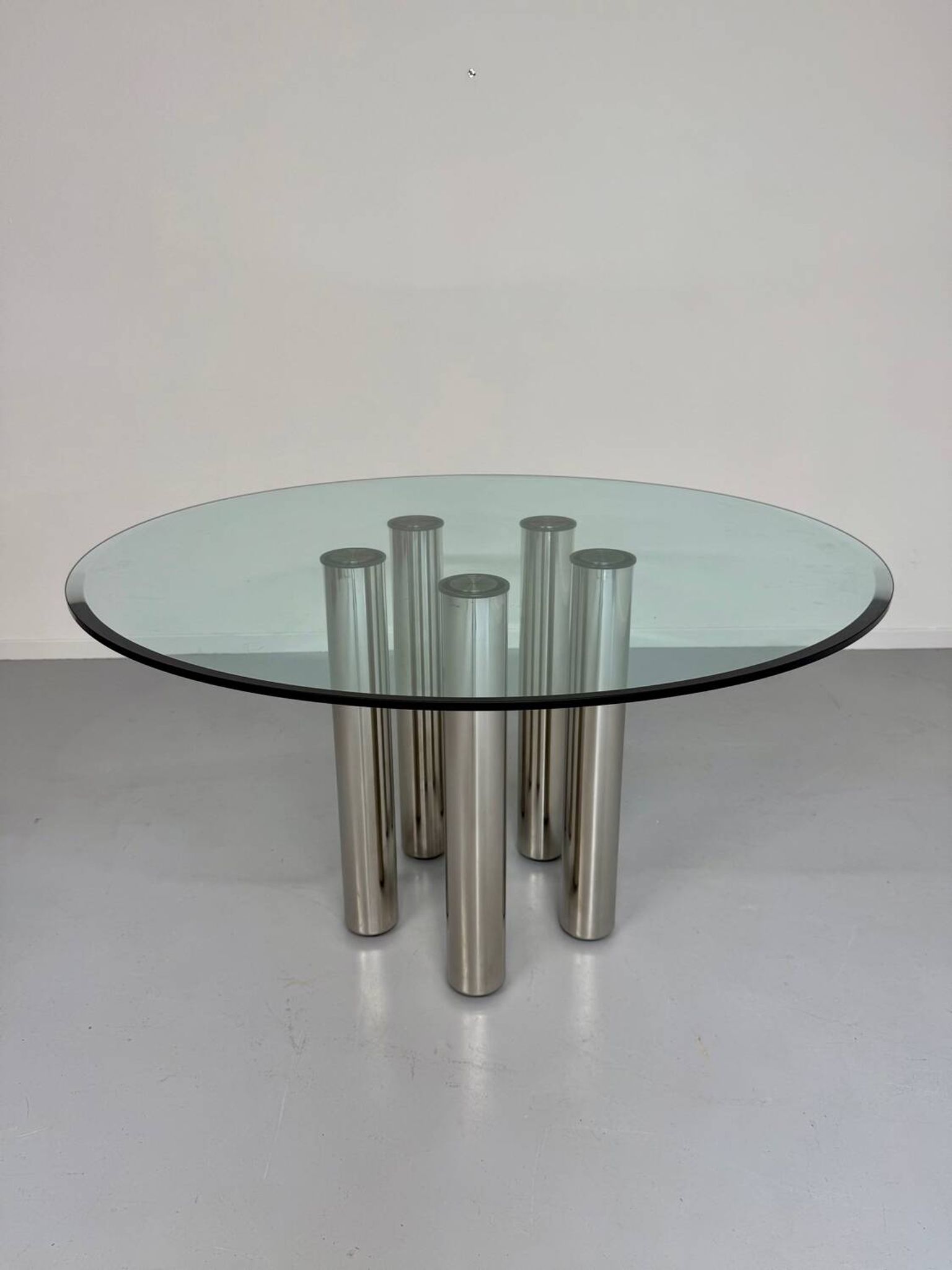 Round glass and metal dining table, Italian design from the 80s, vintage