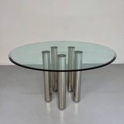 Round glass and metal dining table, Italian design from the 80s, vintage