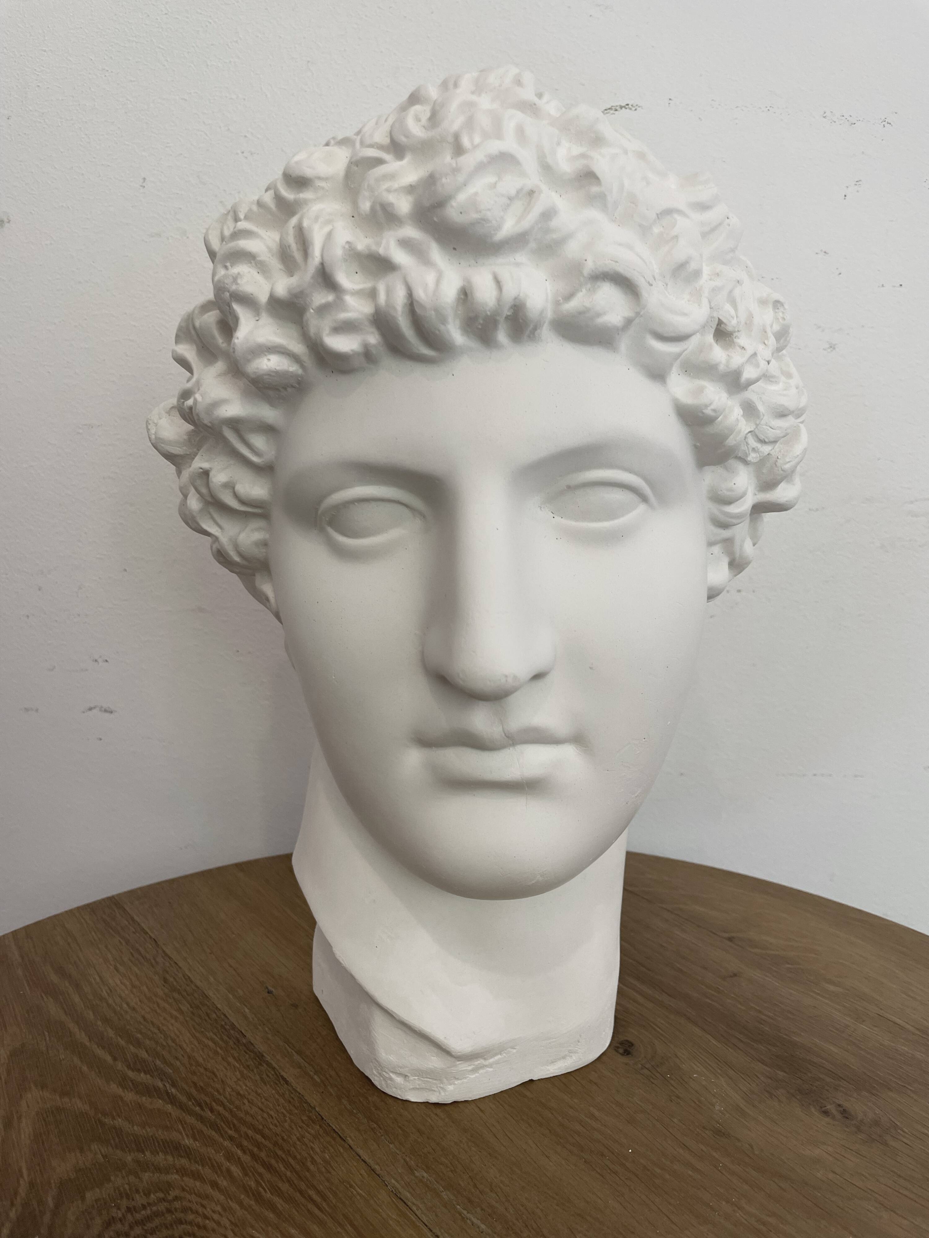White plaster Greek head