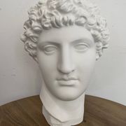 White plaster Greek head