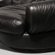 Organically shaped post-modern sectional sofa in black leather