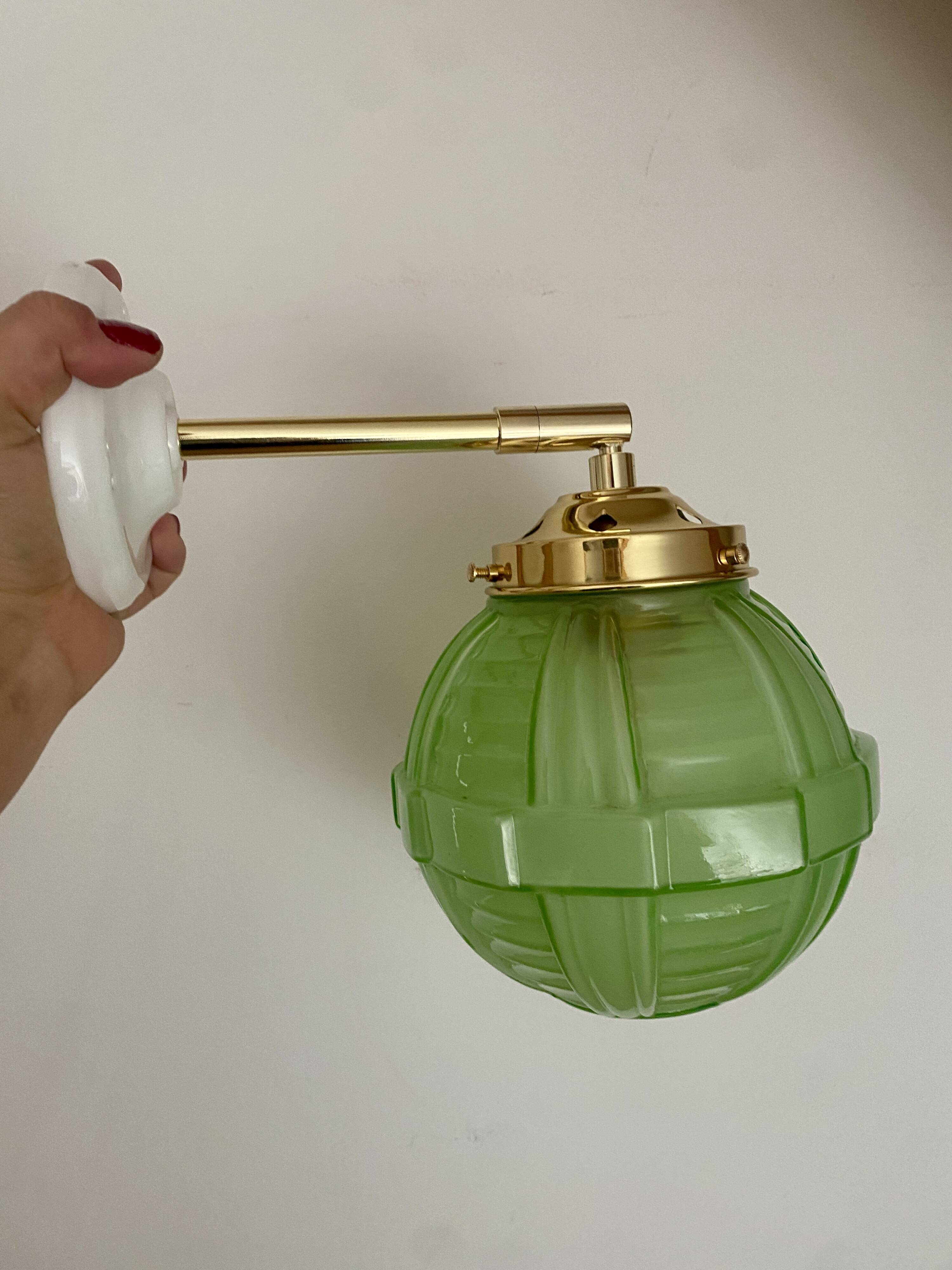 Vintage art deco globe wall light in green glass