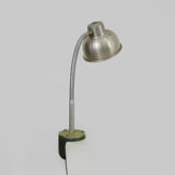 Old industrial articulated lamp with vice. Year 50
