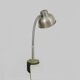 Old industrial articulated lamp with vice. Year 50