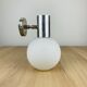 Space age opaline globe wall light, adjustable, and brushed metal, 1960s.