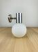 Space age opaline globe wall light, adjustable, and brushed metal, 1960s.
