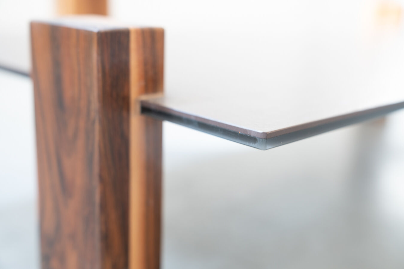 Handcrafted coffee table with ceramic glass top and walnut legs