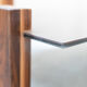 Handcrafted coffee table with ceramic glass top and walnut legs