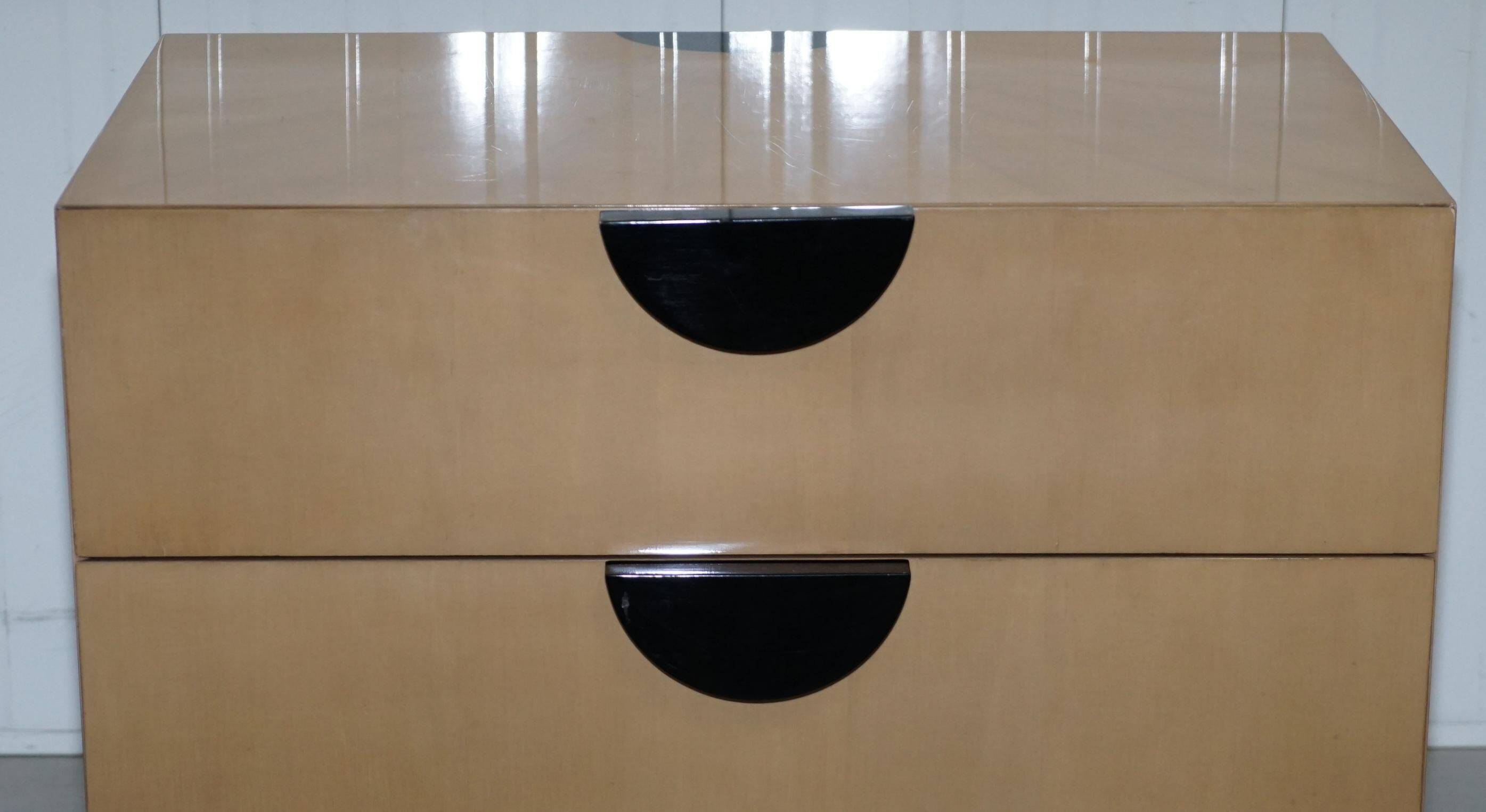 Cloud bedside tables by J Robert Scott with 14-carat gold veneer.