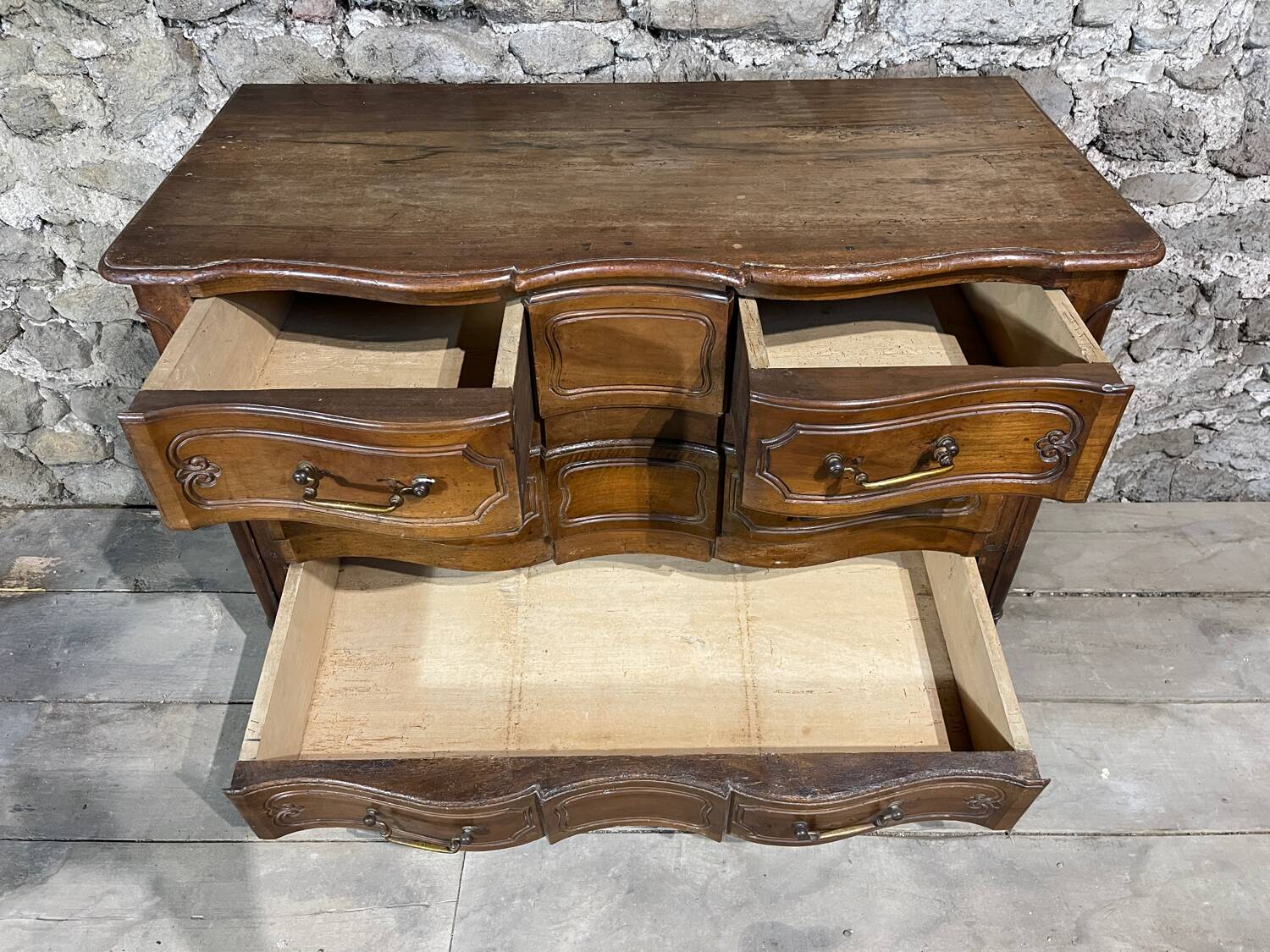 19th century crossbow chest of drawers.