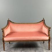 Louis XVI style canapé in carved wood and velvet, 20th century