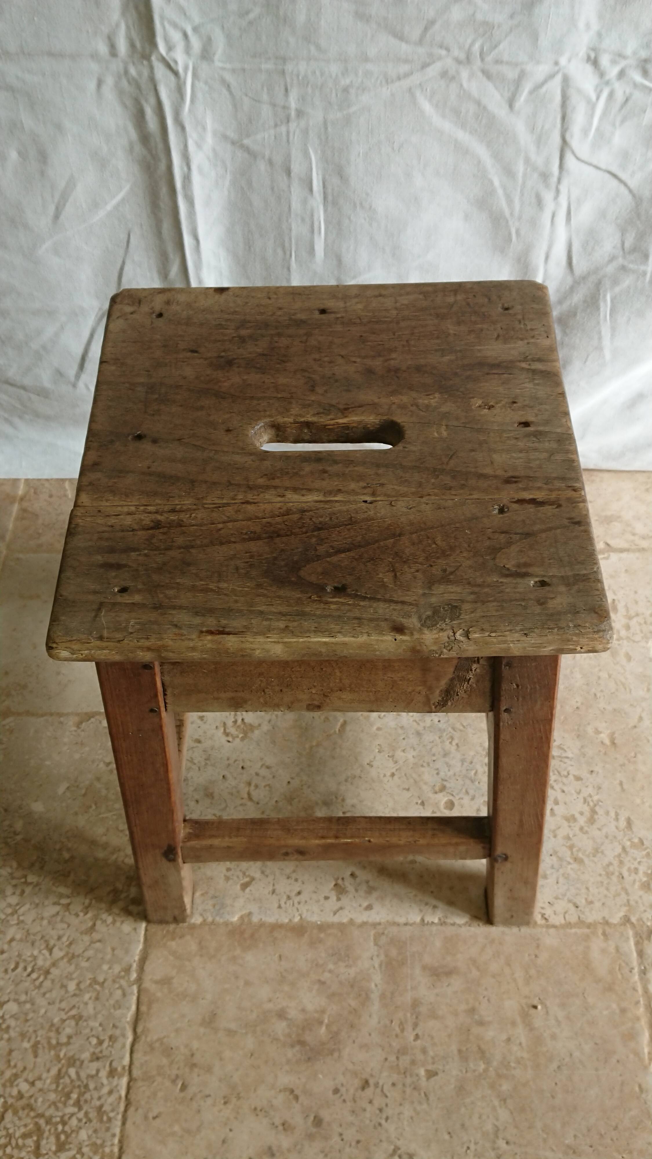 Raw wooden workshop stool