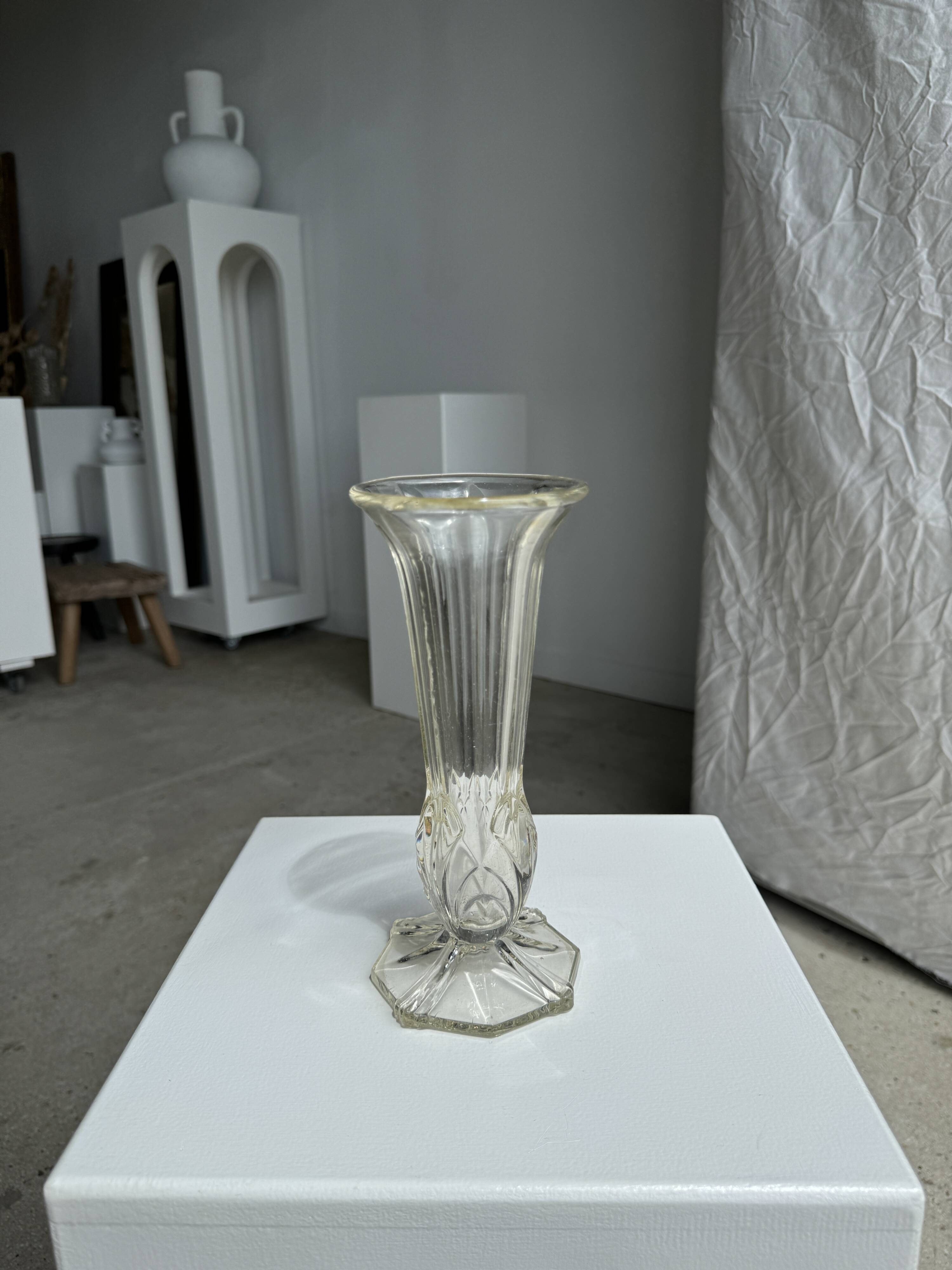 Art deco style flared neck pedestal vase in blown glass