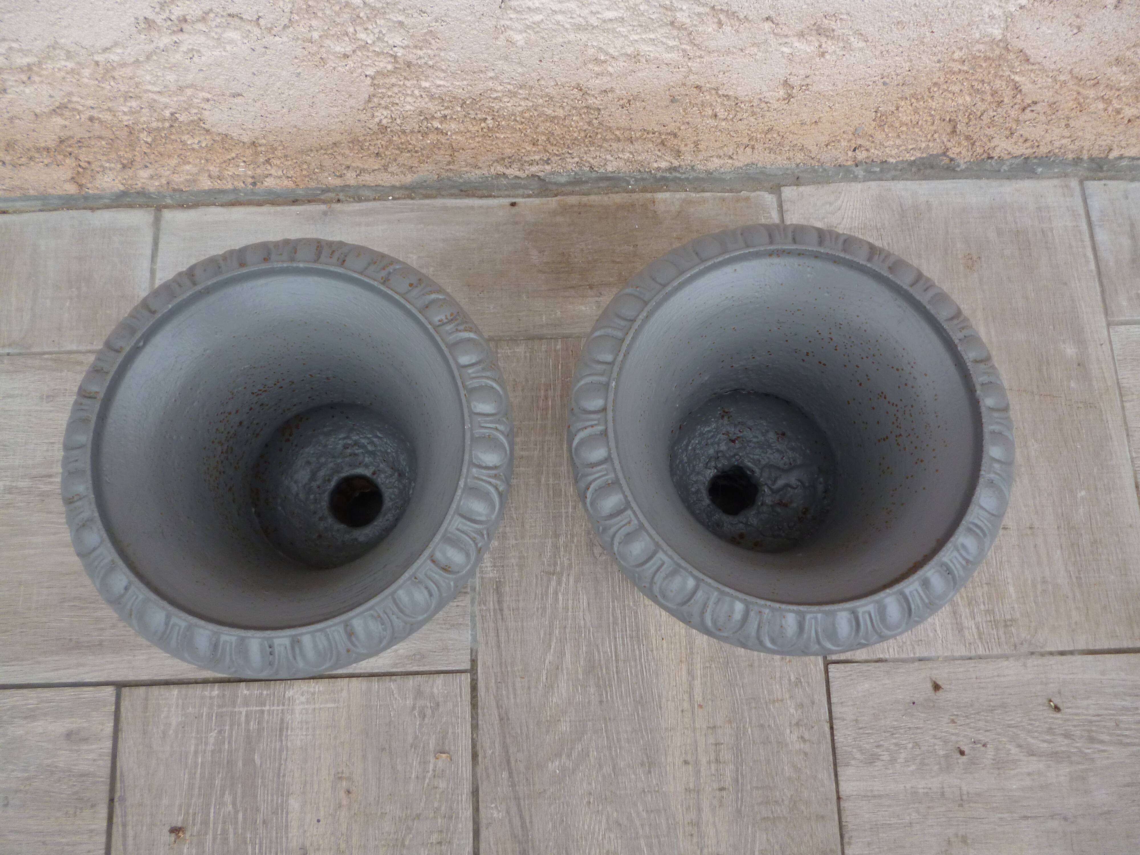 Pair of cast iron Medici vases