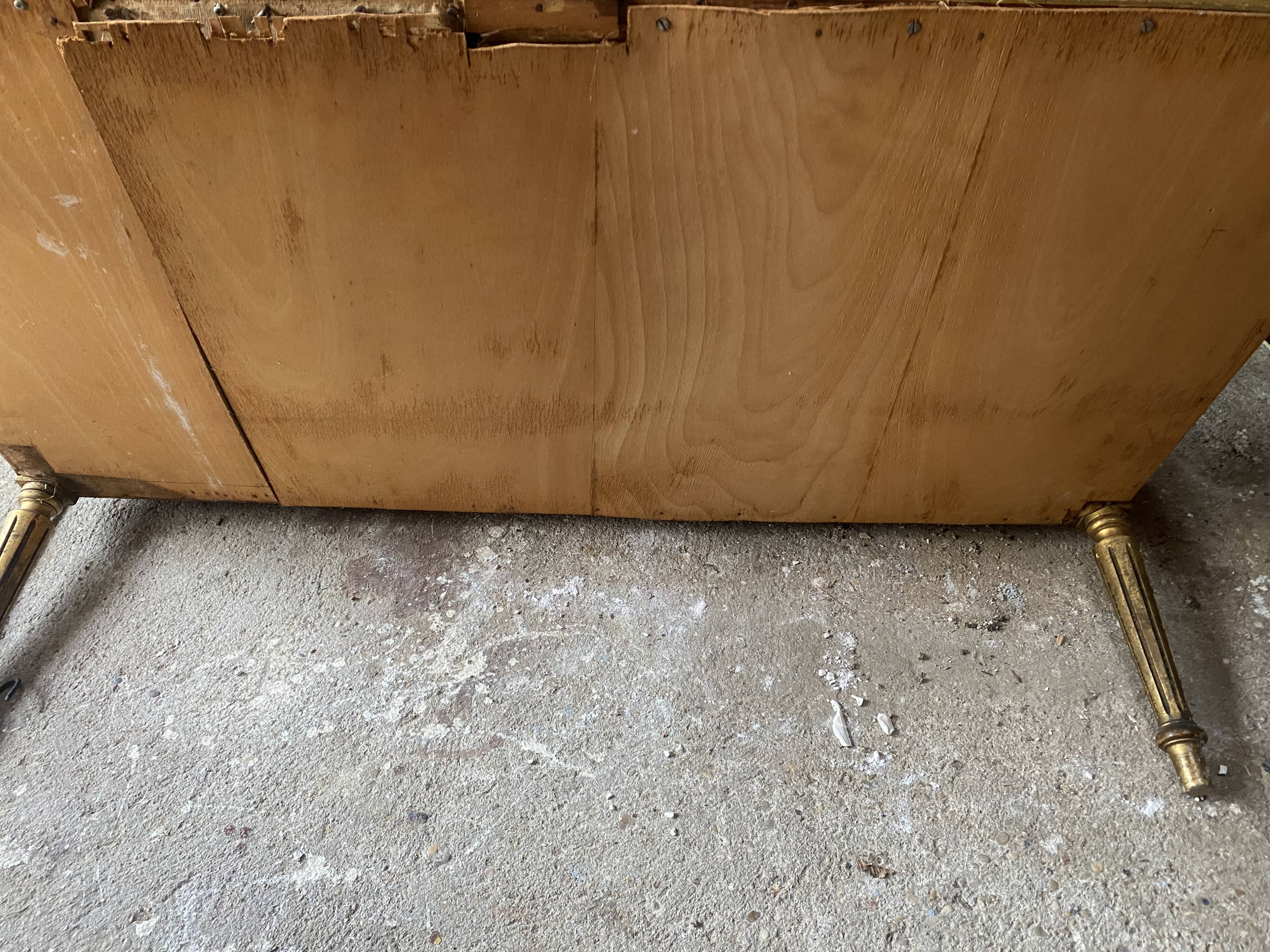 Louis XVI style living room in gilded wood. Napoleon III period