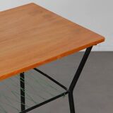 Vintage metal and wood table from the 1960s