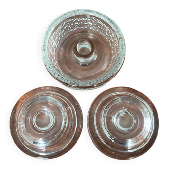 Set of three round thick moulded glass candle holders