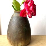 Montigny sandstone vase on the distance