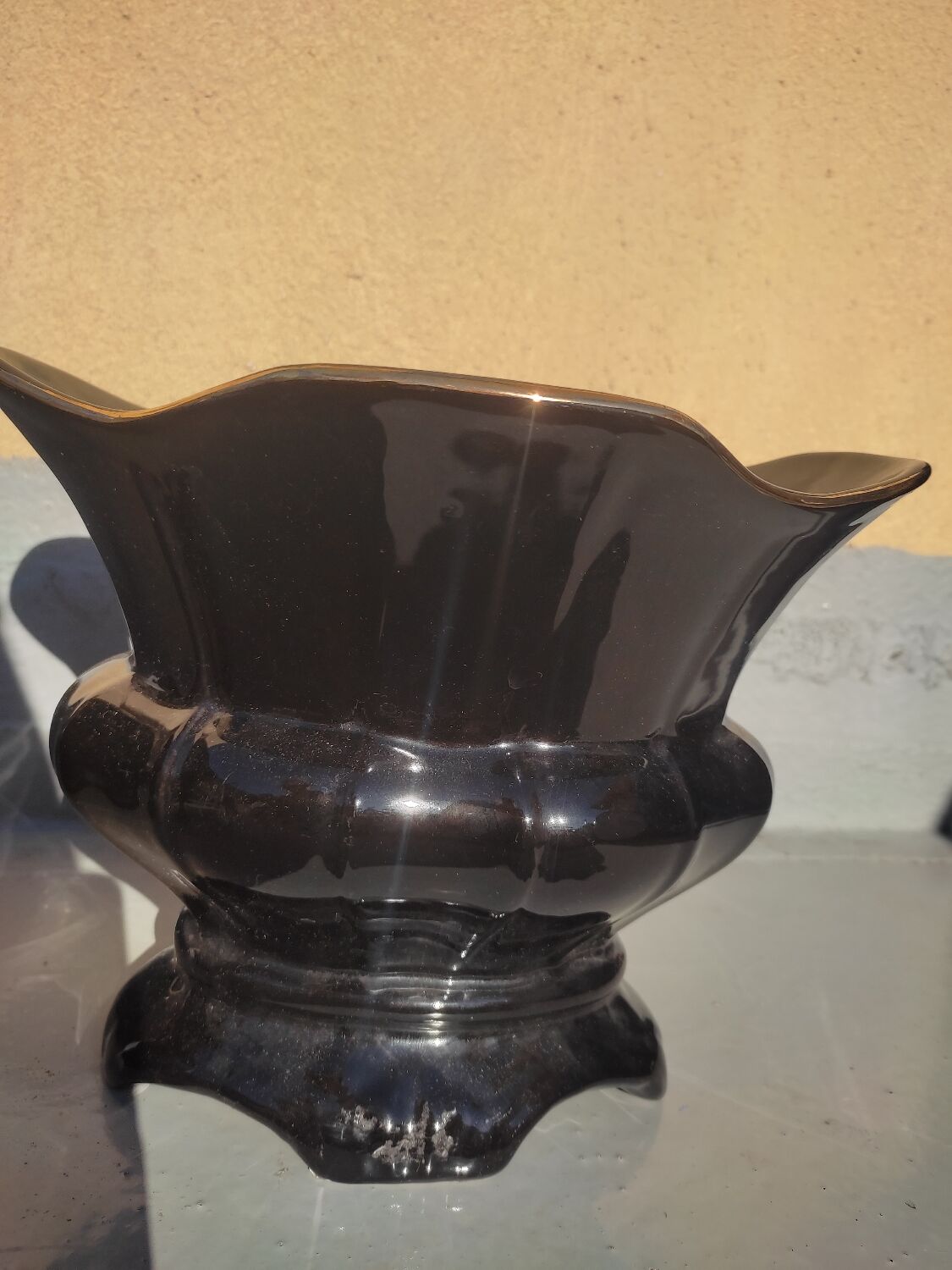 Pair of black earthenware planters