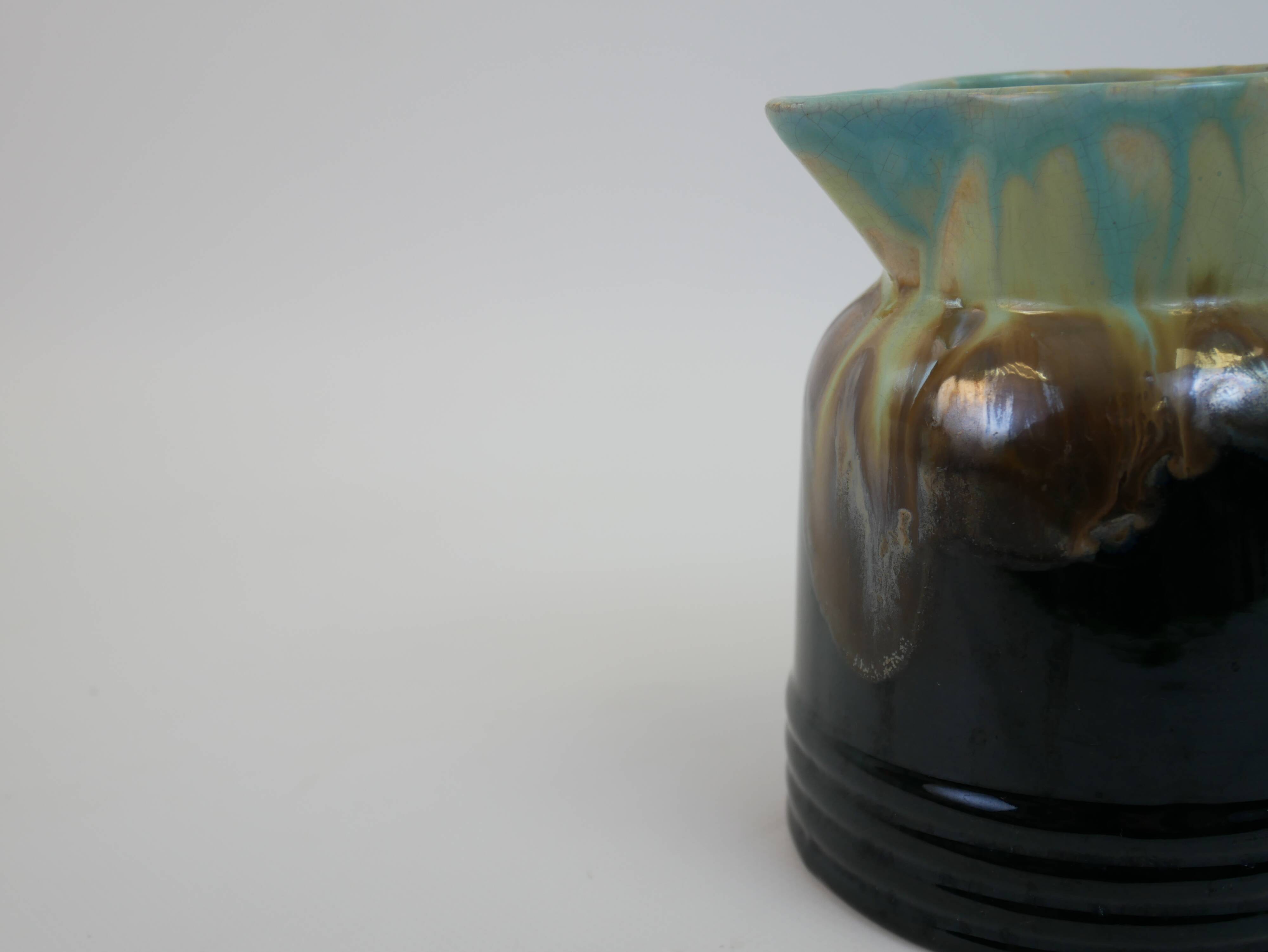 Art Deco pitcher in black, brown and blue glazed ceramic