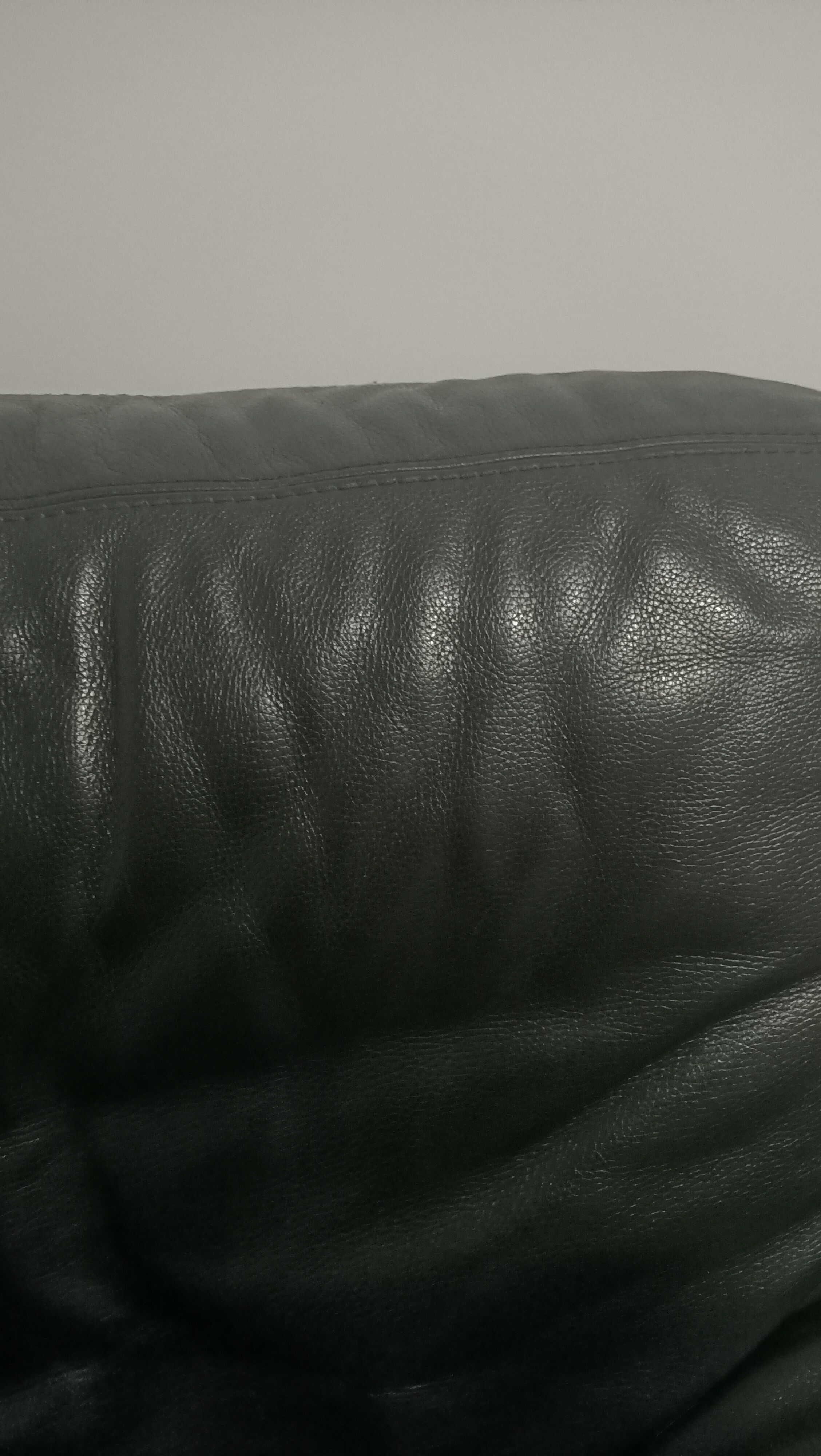 Black leather armchair Natuzzi