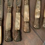Set of coat of arms fruit cutlery