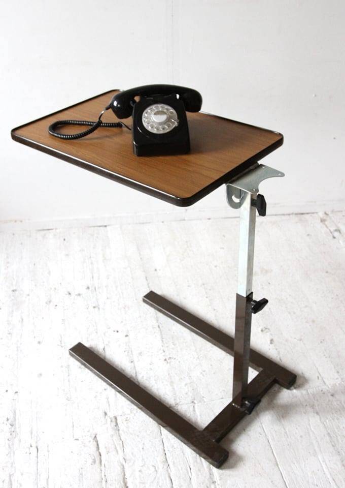 Extendable vintage desk from the 1960s, brown wood and metal structure, practical mid-century design.