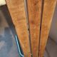 Former vintage wooden school bench and metal tubes