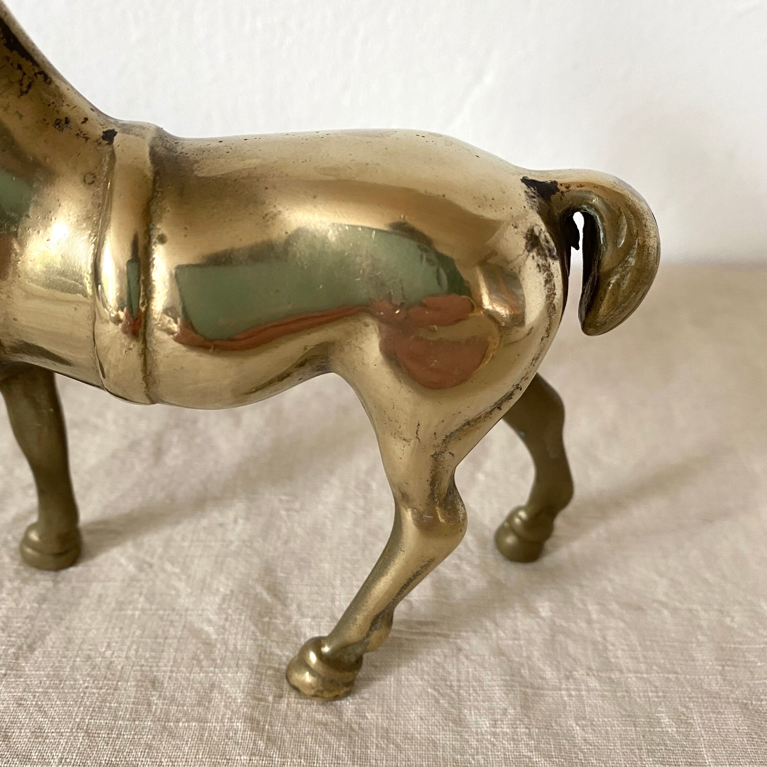 Cheval en laiton doré
