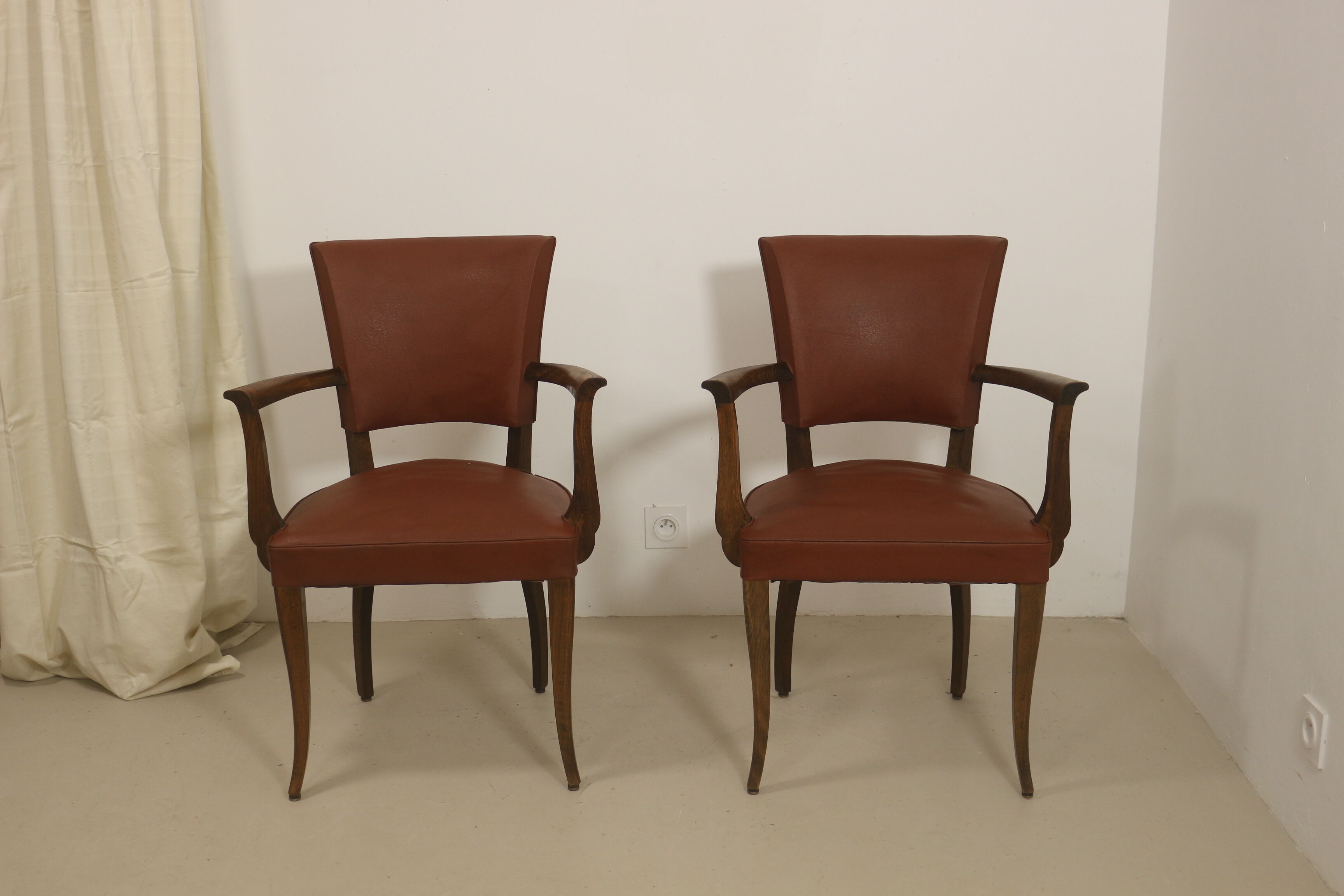 Pair of vintage bridge armchairs year 60 in imitation rust leather.