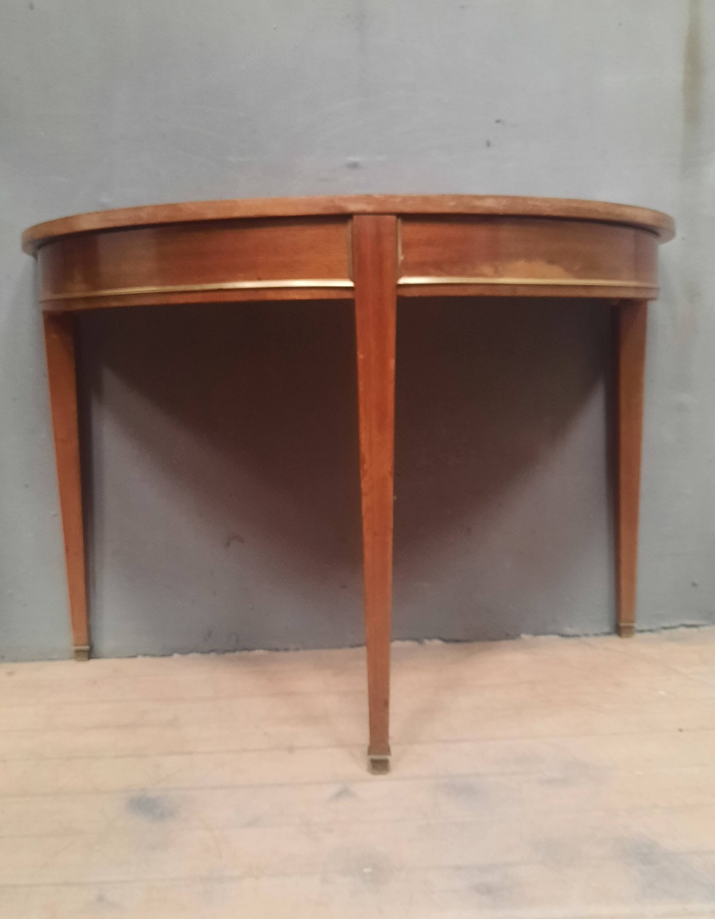 Louis XVI style console in mahogany.